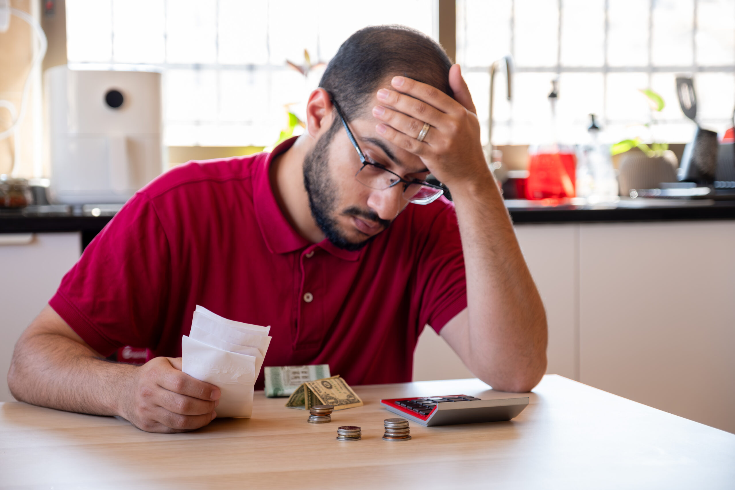 Struggling With Multiple Loans? How Debt Settlement Can Reduce Your Financial Burden