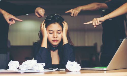 Business woman colleague covering her face with hands looking exhausted and ill. Business problem concept